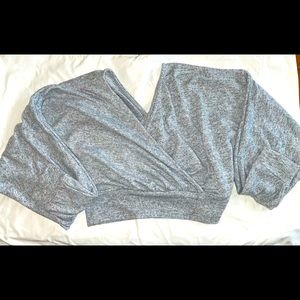Grey V-neck sweater crop top. Size small but can fit up to a medium